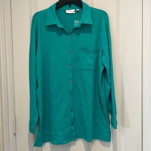 Tunic length boyfriend shirt. Single front pocket, long sleeves with button cuff